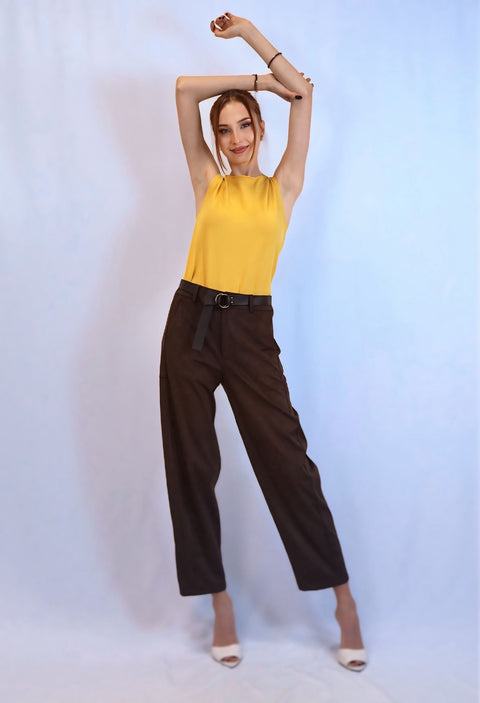 Dark brown pleated tailored trousers with a self-belt and tapered ankle leg