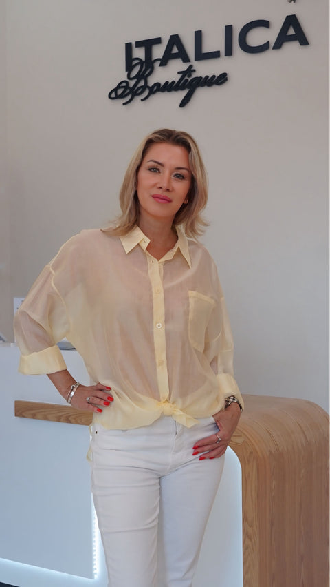 Sheer oversized pale yellow shirt tied at the front, semi-sheer viscose